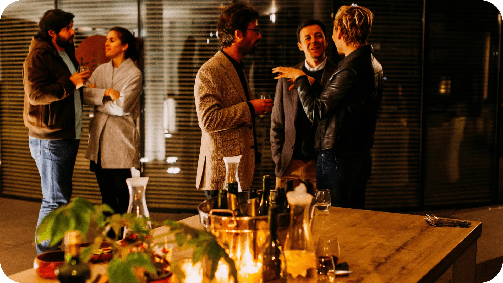 People talking at a networking event.